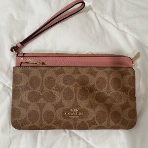 Coach Signature Pink Wristlet. Like new.